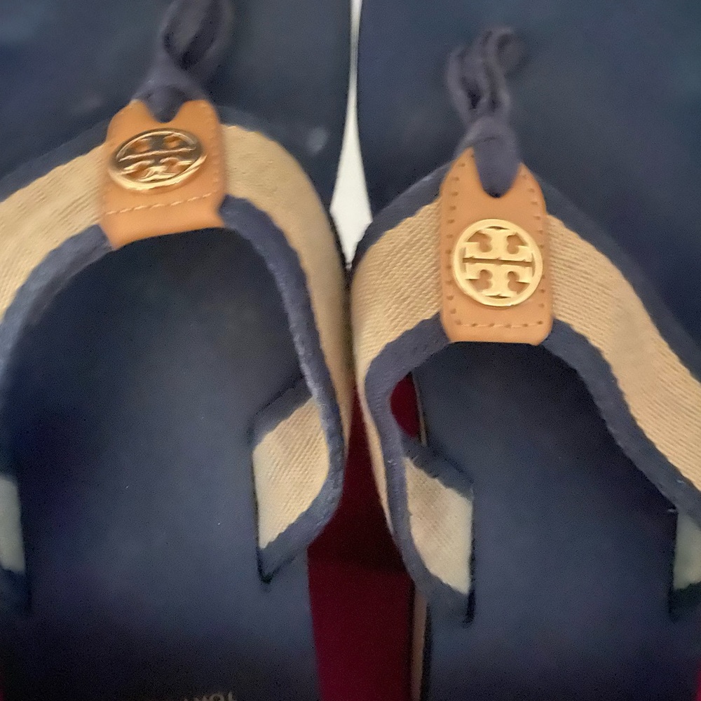 Tory Burch size 10 wedge flip flop. Slightly worn.